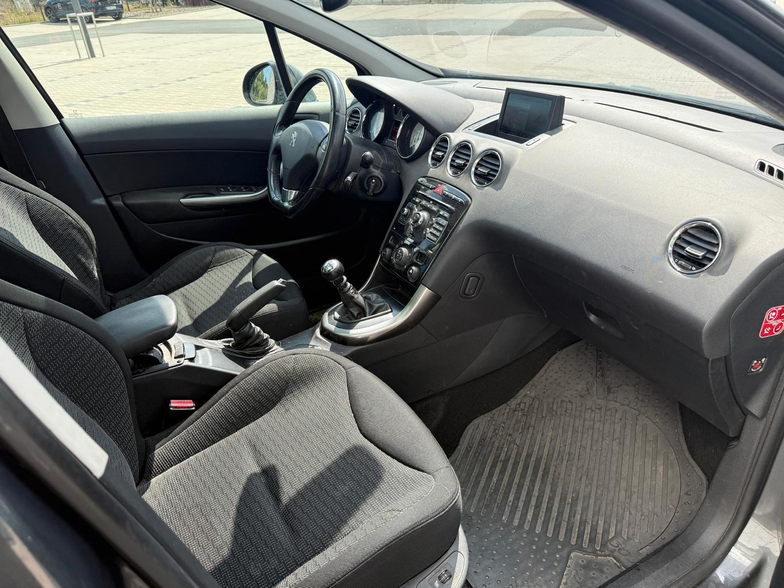 Peugeot 308 2013 — photo 11