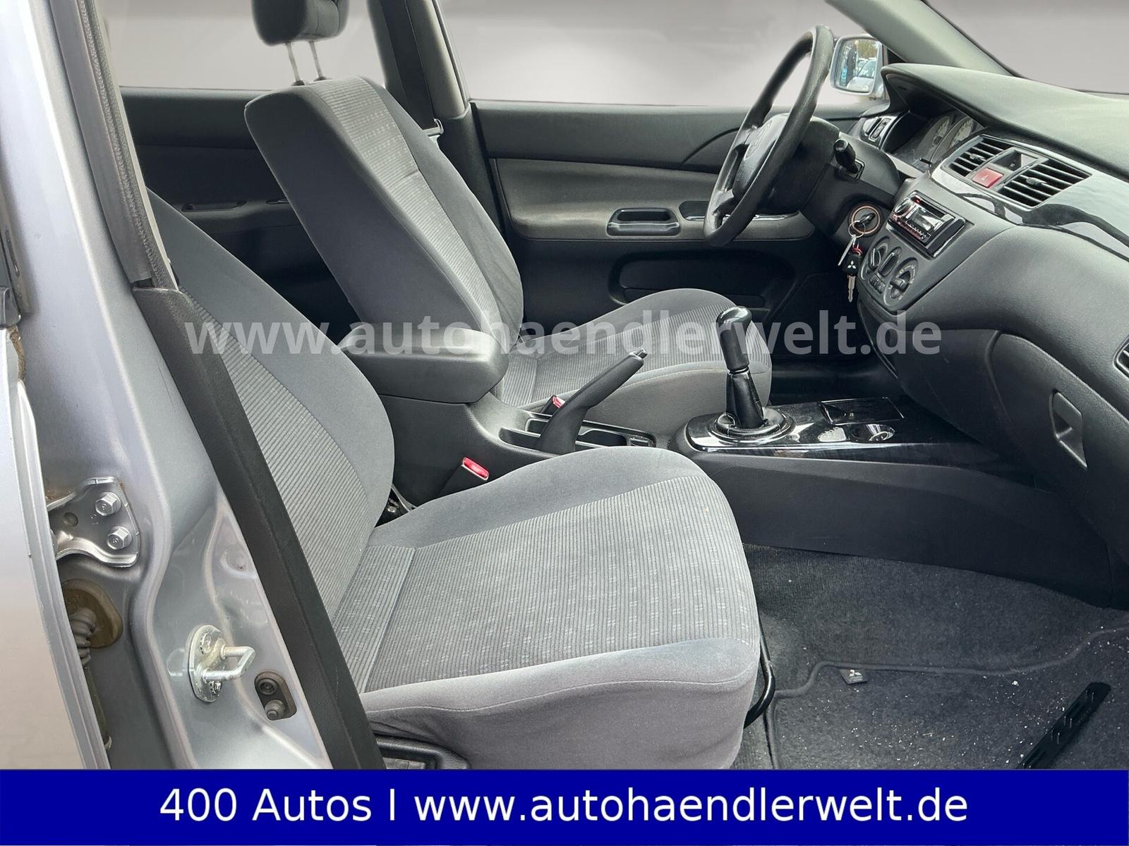 Mitsubishi Lancer 2005 — photo 13