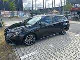 Toyota Corolla 2,0 Hybrid Team Deutsch Touring Spor... - gebrauchte Toyota Corolla aus dem Jahr 2021