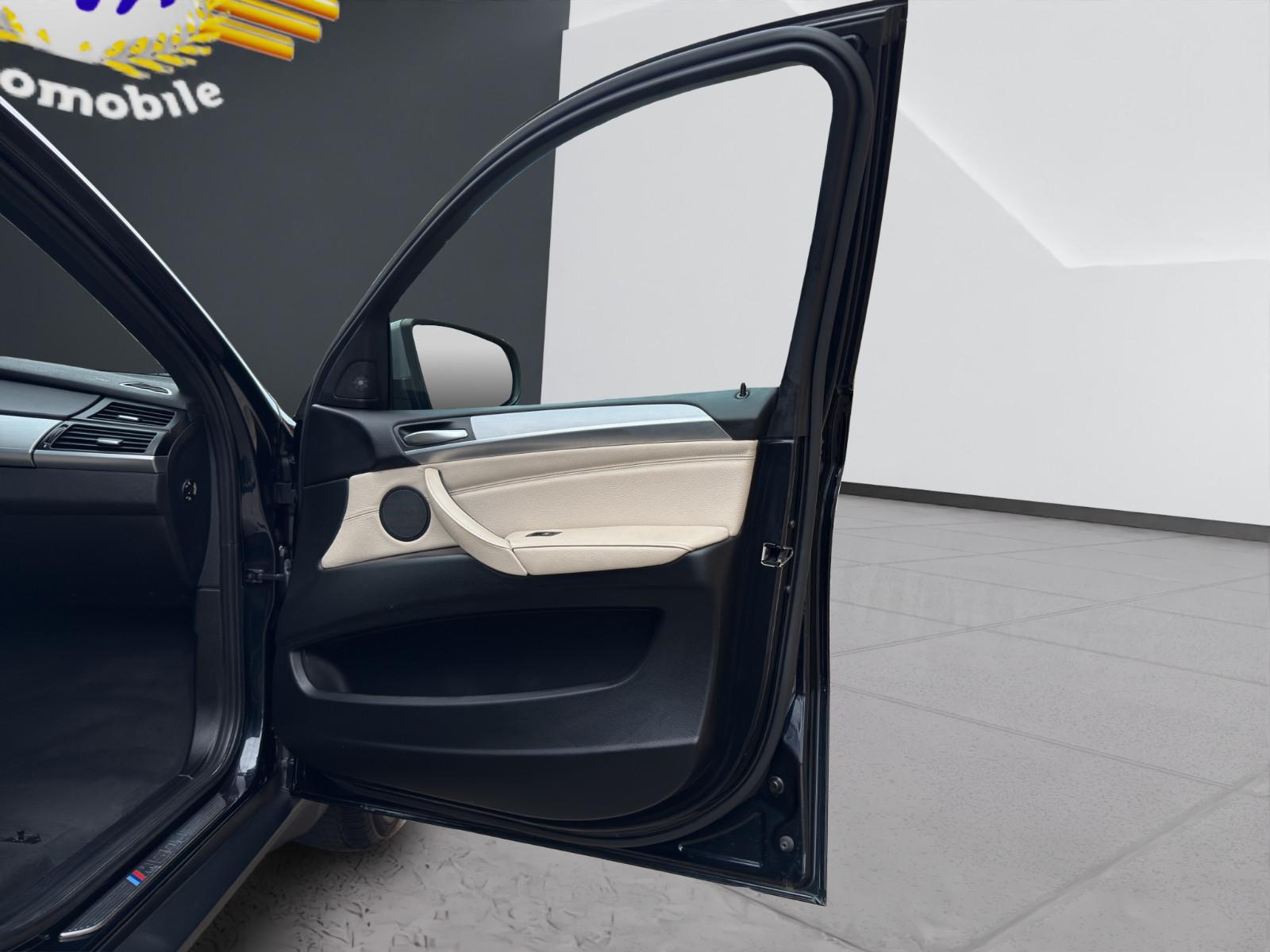 BMW X6 M50d 381 ch • Head-up • Toit ouvrant • Phares LED adaptatifs • Caméra • Cuir Nappa beige