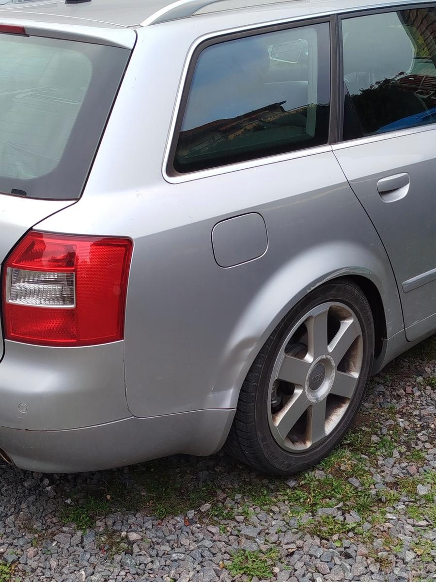 Audi A4 2004 — photo 12