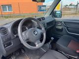 Suzuki Jimny Black and White Lim./Klima/HU 2027 - Suzuki: An