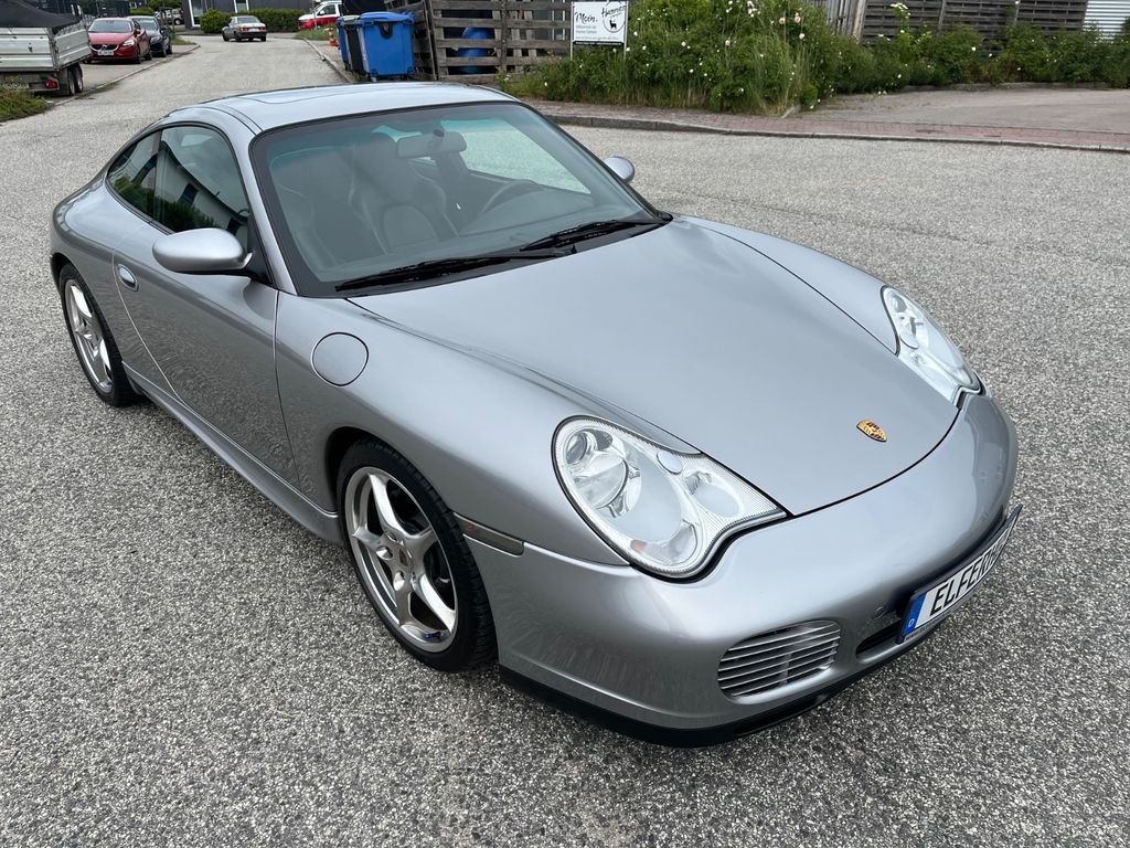 PORSCHE 911 996 Carrera Coupé Jubiläumsmodell Deutsch PORSCHE 911 996 Carrera Coupé Jubiläumsmodell Deutsch