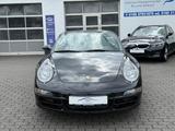 Porsche 911 Carrera Cabrio 997 | Schalter |SAGA |Deutsch - schwarze Porsche 911 Urmodell