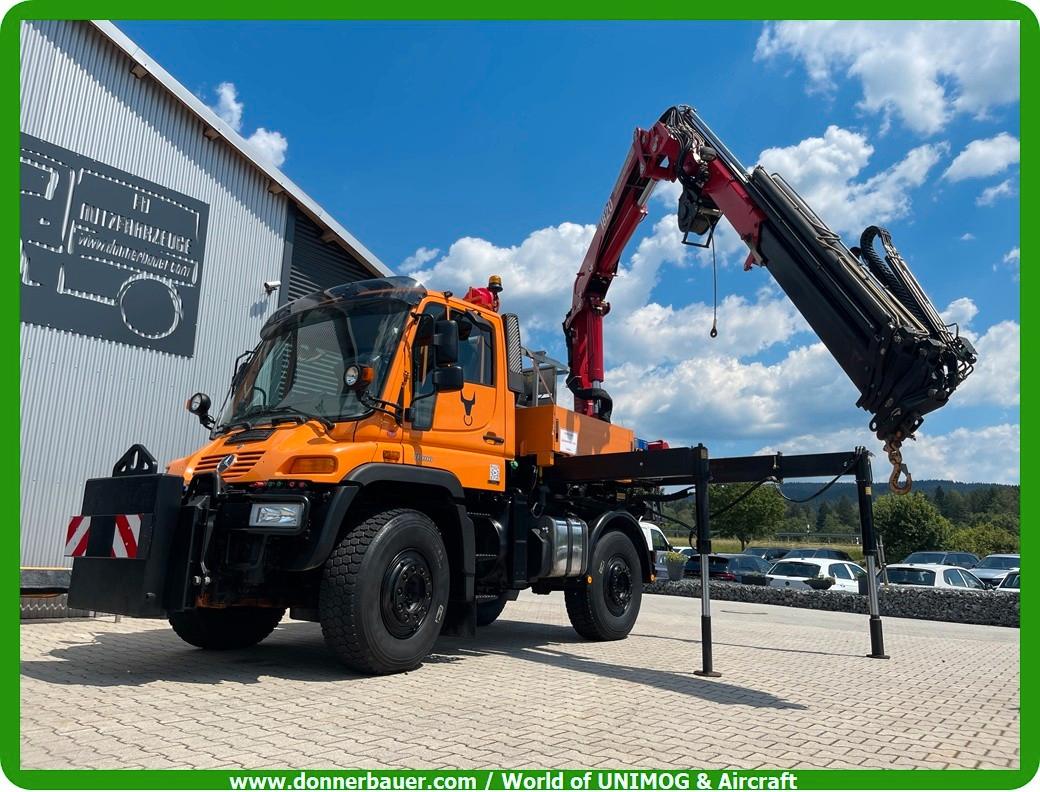 Unimog U500 mit Mega Kran , Kranseilwinde, Korb