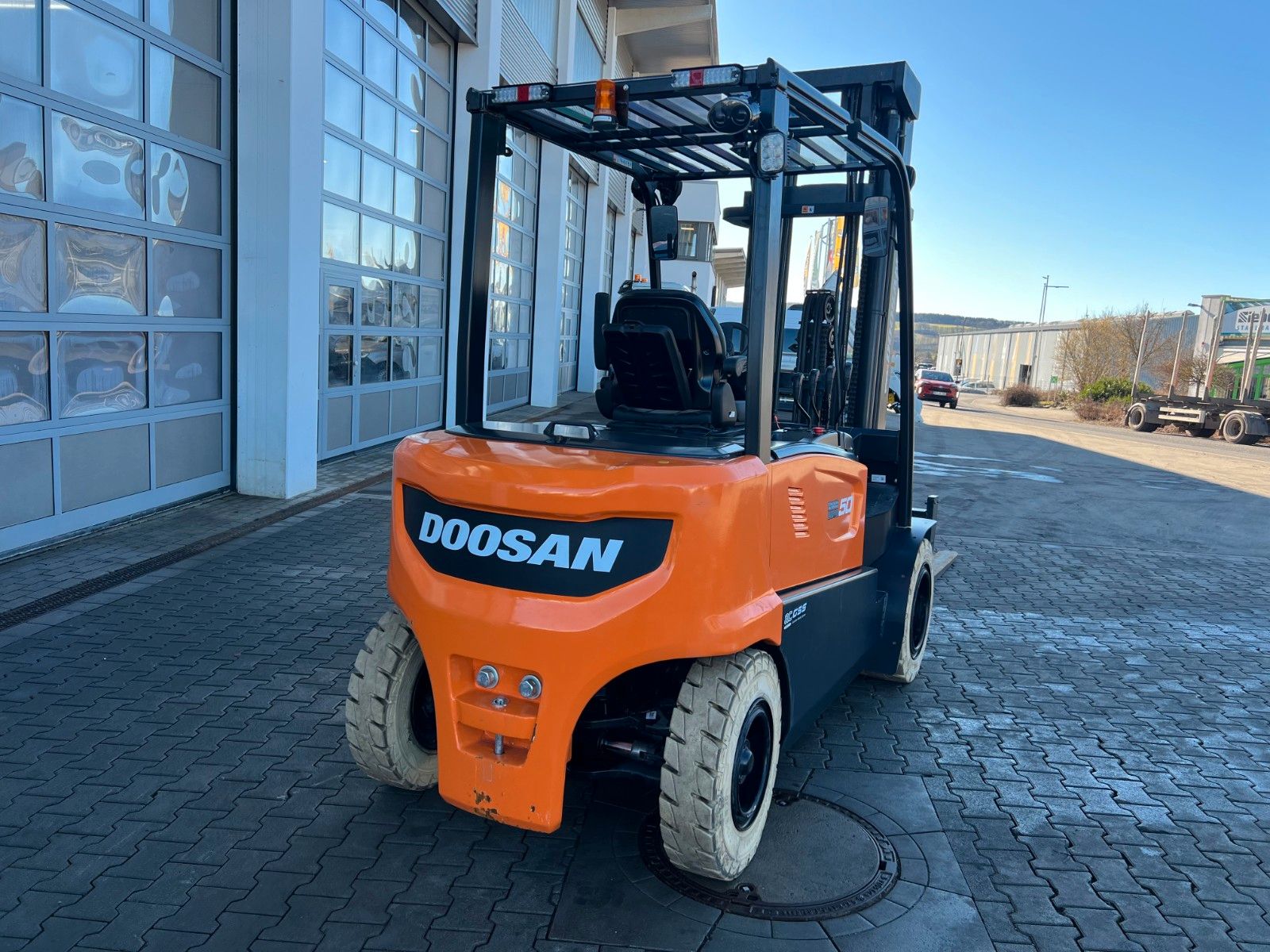 Fahrzeugabbildung Doosan B50XC-7 / nur 230h! / SS / Zinkenverstellung