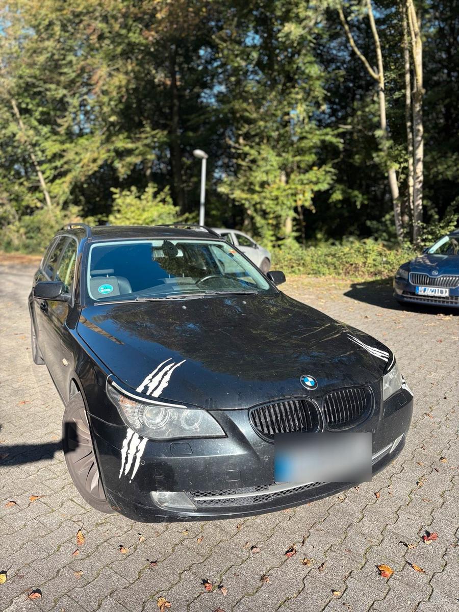 BMW 525 2007 — rear view