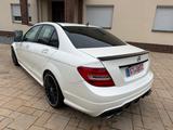 Mercedes-Benz C 63 AMG+Leder+Navi+SSD+H&K+Rückf.+Klappen+ - gebrauchte Mercedes-Benz C 63 AMG aus dem Jahr 2012