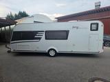 HYMER / ERIBA / HYMERCAR exciting 560 family  - HYMER / ERIBA Rundsitzgruppe Wohnwagen