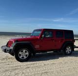 Jeep Wrangler Unlimited Sport 2.8 CRD Sport - Jeep Wrangler: Rot