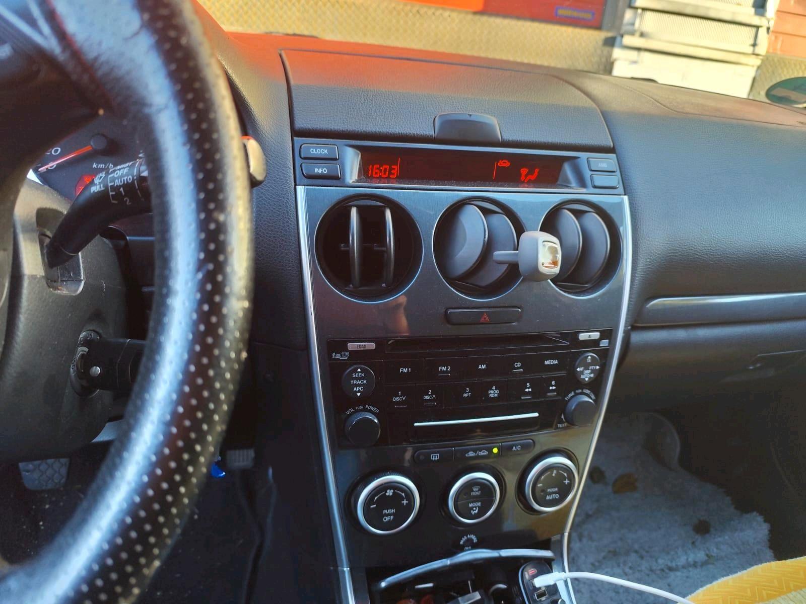 Mazda 2 2006 — photo 6