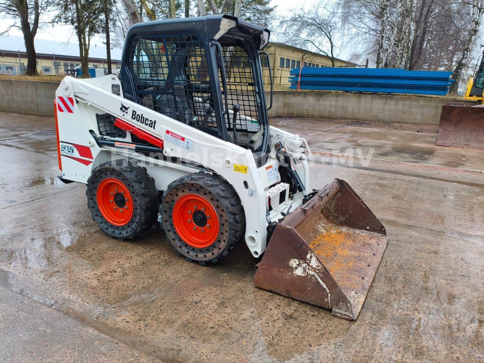 Bobcat S450 Kompaktlader Skid steer loader mit Schaufel