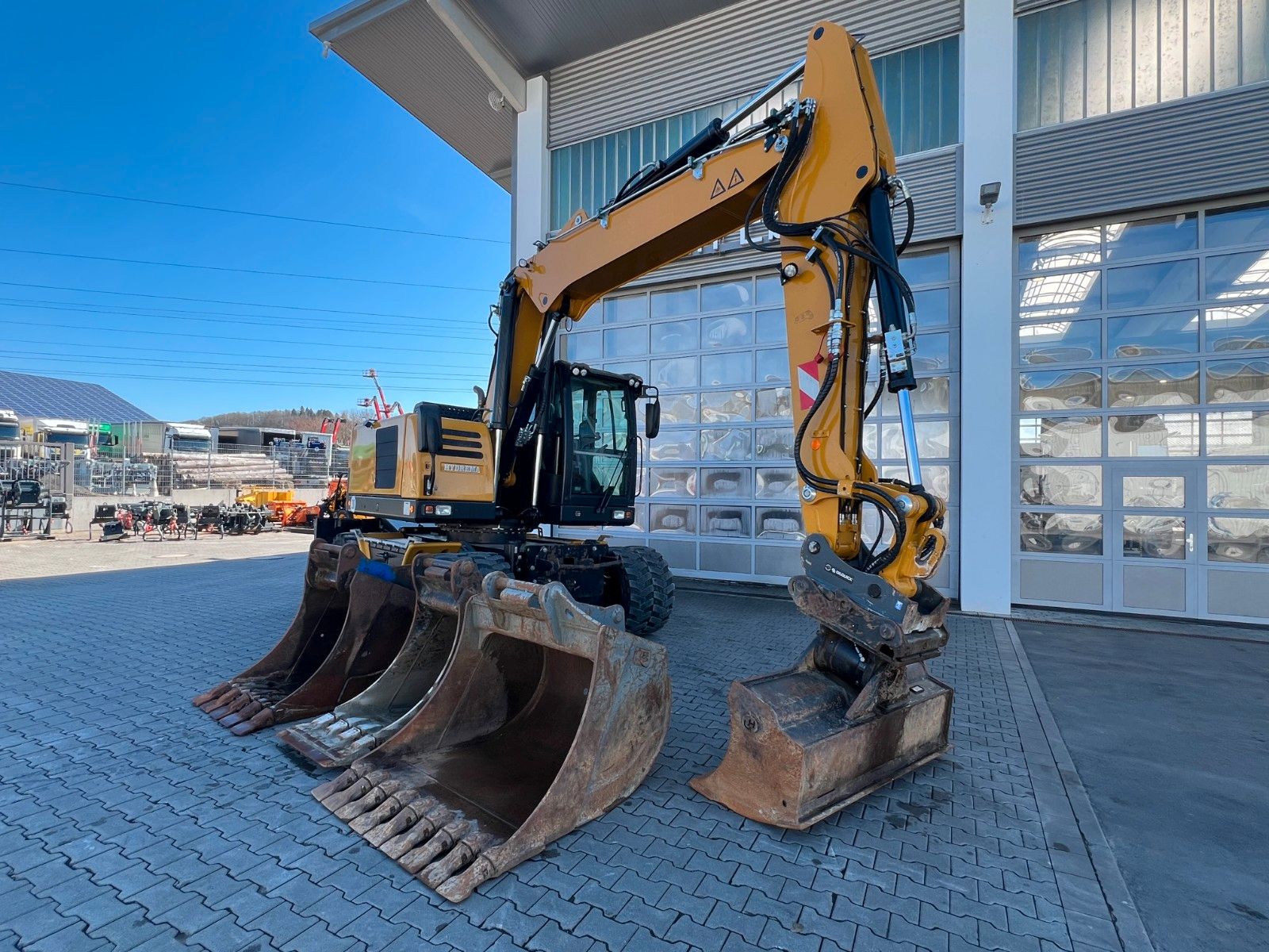 Fahrzeugabbildung Hydrema MX14G / OilQuick OQ65 / 4x Löffel / 1.655h /2022