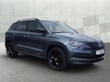 Skoda Karoq 2.0 TSI DSG 4x4 Sportline AHK*NAV*ACC*RFK* - gebrauchte Skoda Karoq aus dem Jahr 2019