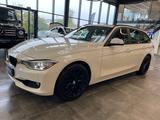 BMW 320 i Touring *Bi-Xenon*Unfallfrei*Navi* - BMW 320 mit Benzin-Antrieb: Panorama-Dach