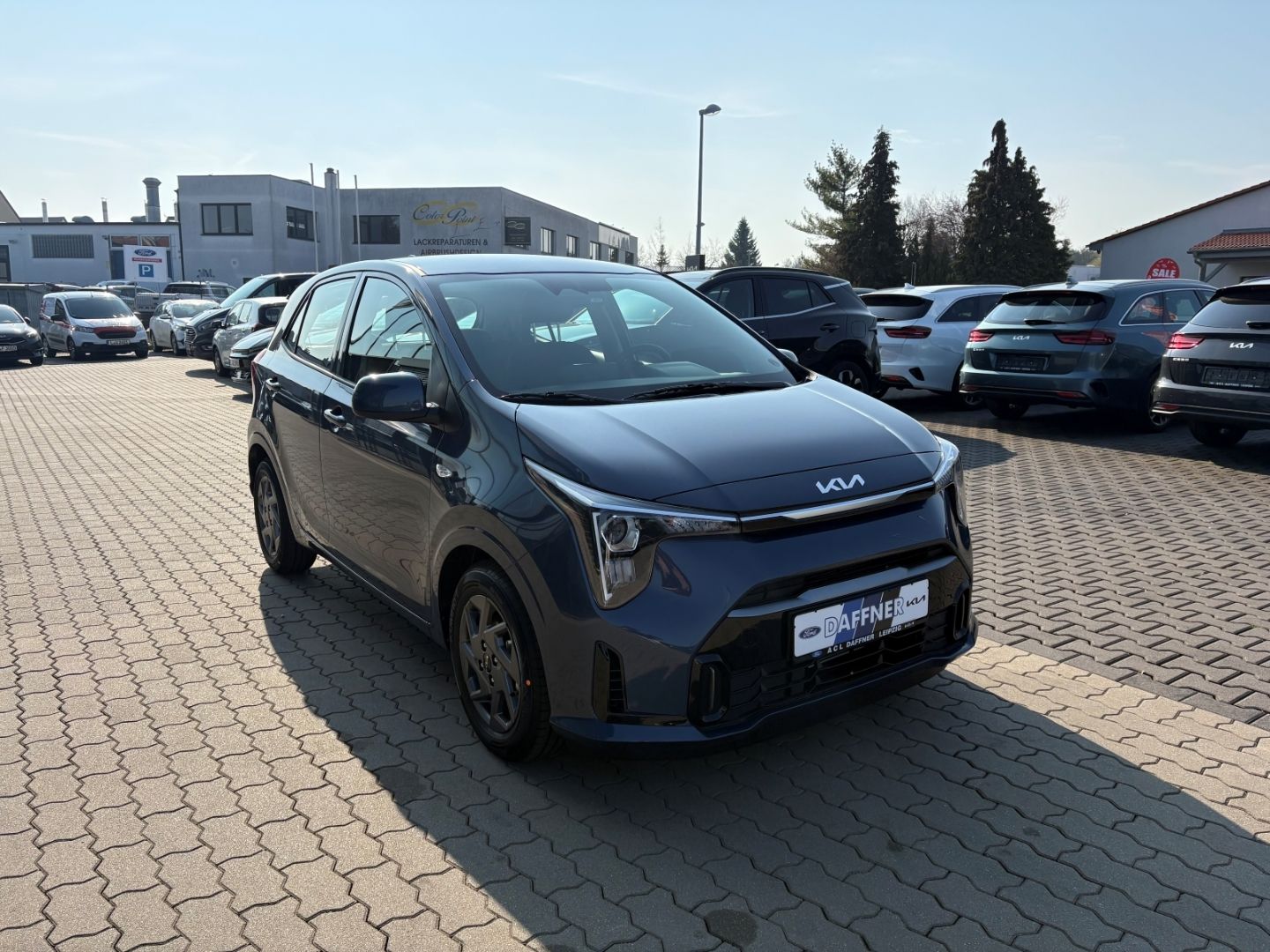 Fahrzeugabbildung Kia Picanto Vision Verkehrszeicherk Rückfahrkamera A