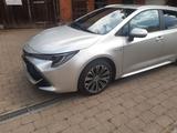Toyota Corolla 2,0 Hybrid Team Deutsch Touring Spor... - Toyota Corolla mit Benzin-Antrieb: Kombi