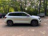 Skoda Karoq 1.5l TSI ACT DSG SPORTLINE SPORTLINE - Skoda Karoq Gebrauchtwagen in Hamburg