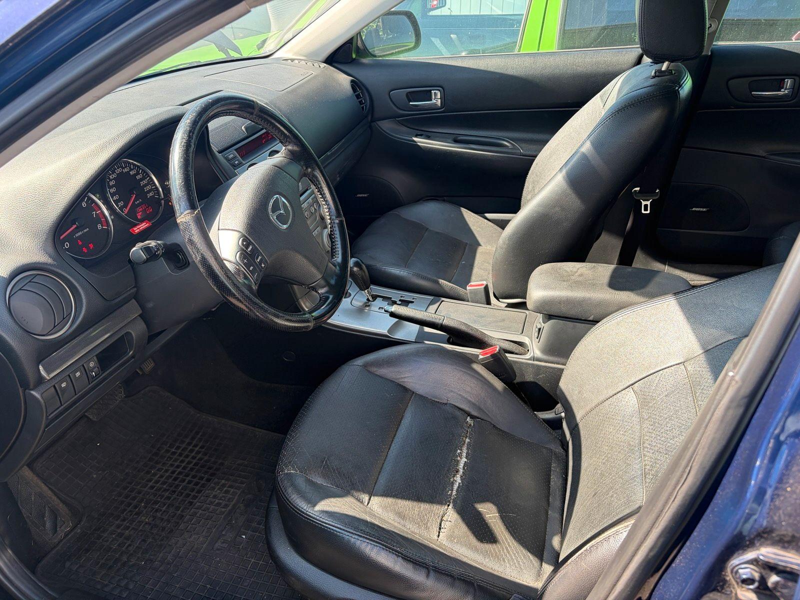 Mazda 2 2004 — photo 9