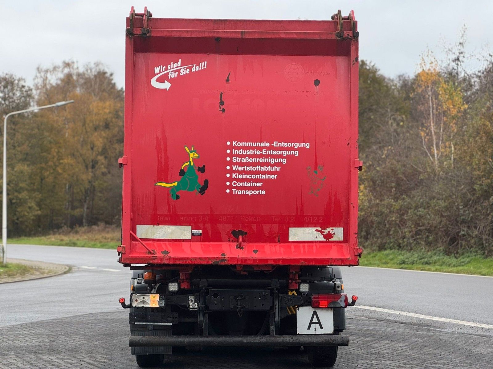 Fahrzeugabbildung MAN TGA 26.320 B/L  6x2 Faun Seitenlader Müllwagen