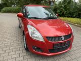 Suzuki Swift ,Servo,USB,Klima,TÜV/AAU 07/2028 - Suzuki Swift mit Benzin-Antrieb: Orange