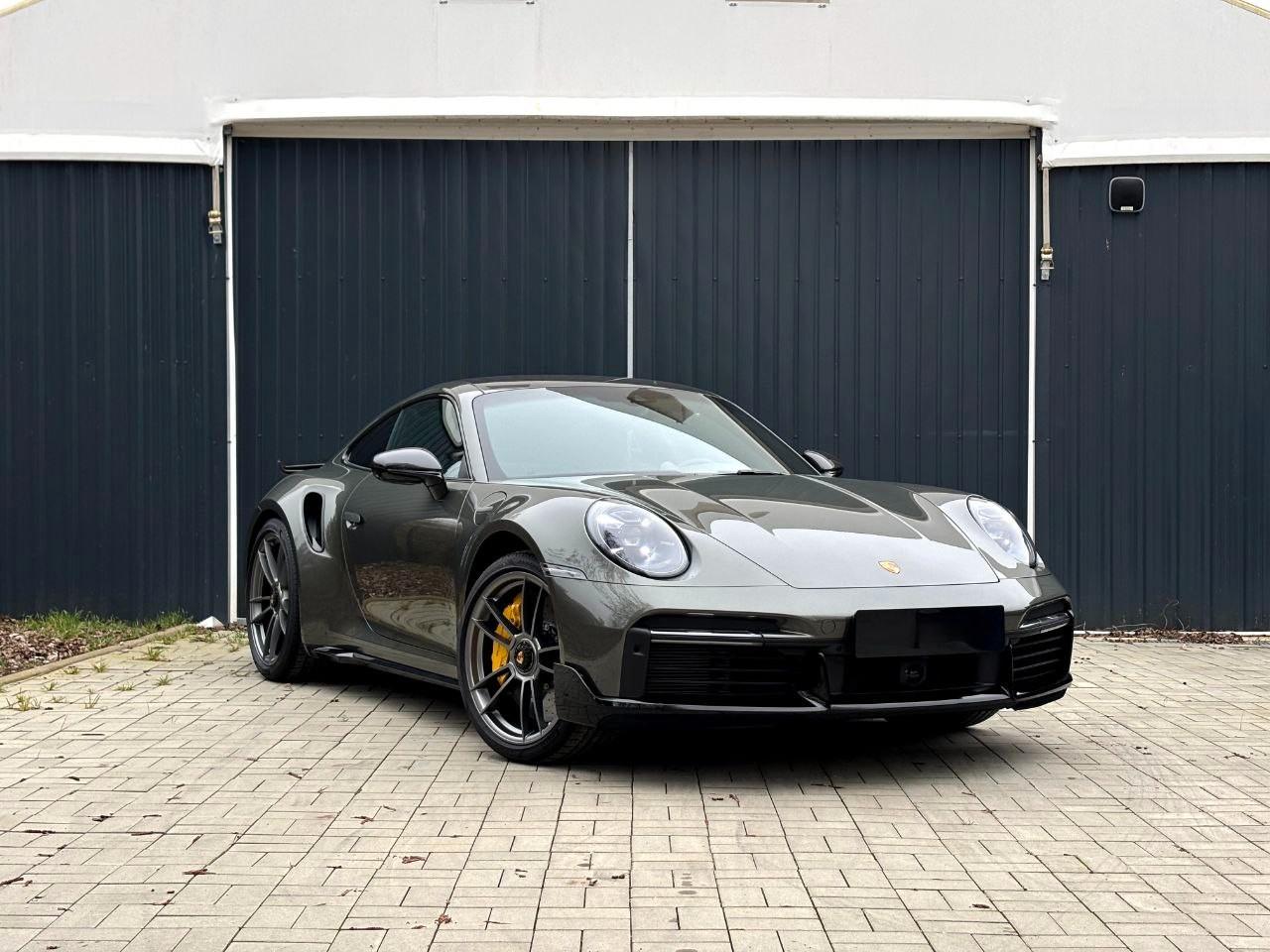 Porsche 992 Sportpaket Aventuringrün Garantie 12/28