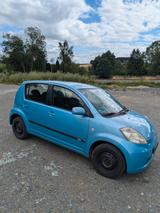 Daihatsu Sirion 1.3 ECO 4WD | Nur 81.300 km | TÜ - gebrauchte Daihatsu Sirion aus dem Jahr 2008