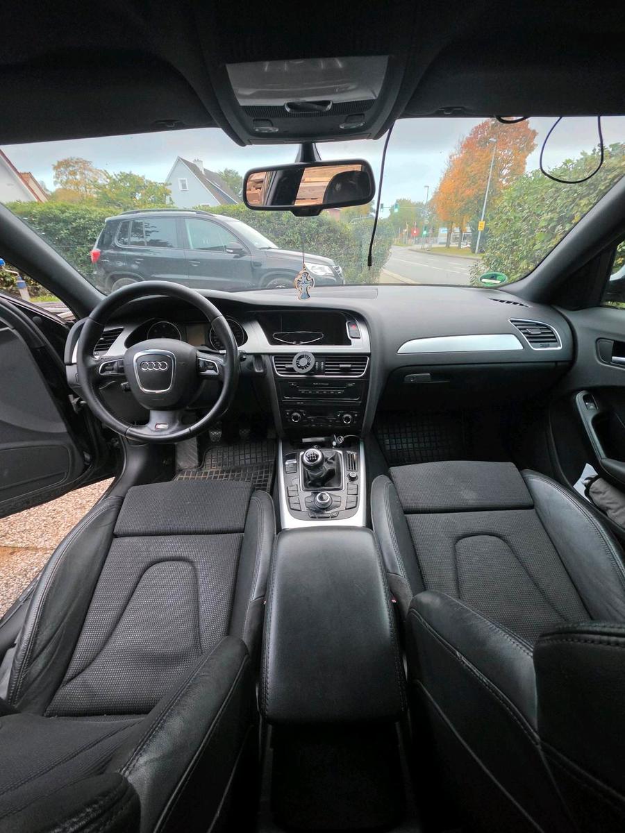 Audi A4 2009 — photo 12
