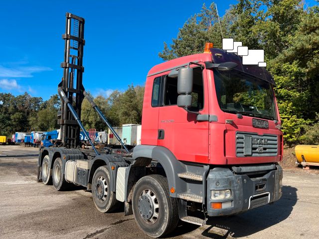 MAN TGA 32.390 ABROLLER BJ 2014 SILOSTELLER