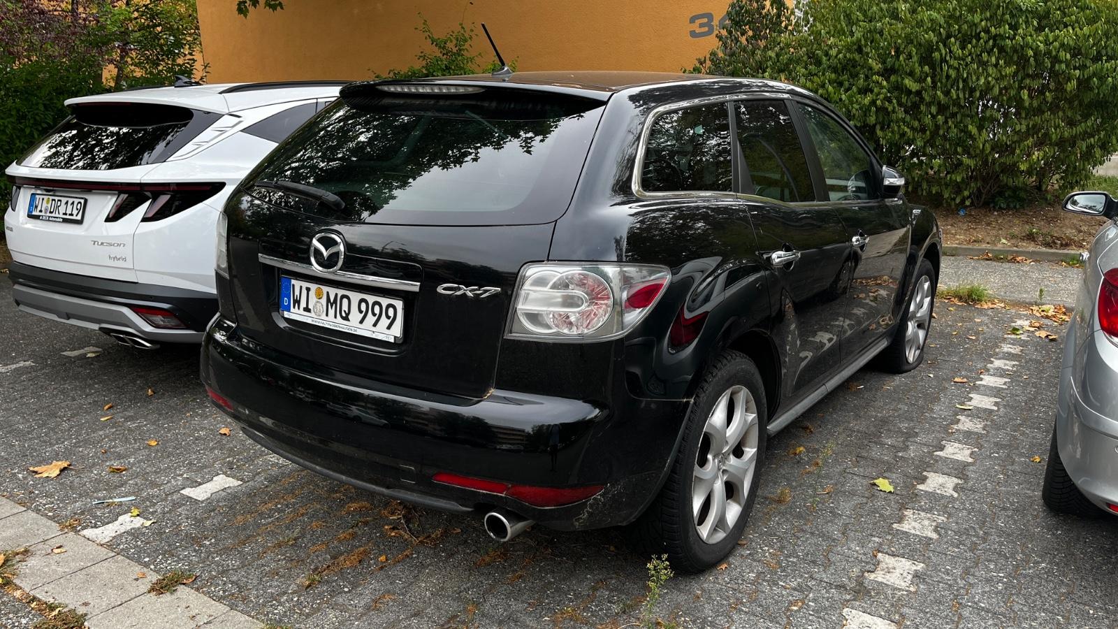 Mazda CX-7 2011 — rear view