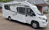 Carado T449 mit Hubbett, Navi, Fahrradträger + SAT TV - Carado Integrierter