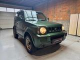 Suzuki Jimny Ranger Lim. 1.3 KAT Metallic+AHK+1. HAND+ - gebrauchte Suzuki Jimny aus dem Jahr 2011