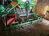 Amazone Drille AD-P 403 Super und Kreiselgrubber KG 4000 - Amazone LKWs