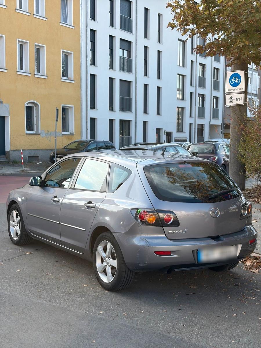 Mazda 3 2005 — engine 110 HP (81kW)