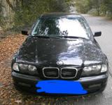 BMW 318i mit noch verpackten Ersatzteilen - BMW aus 1998: 3er