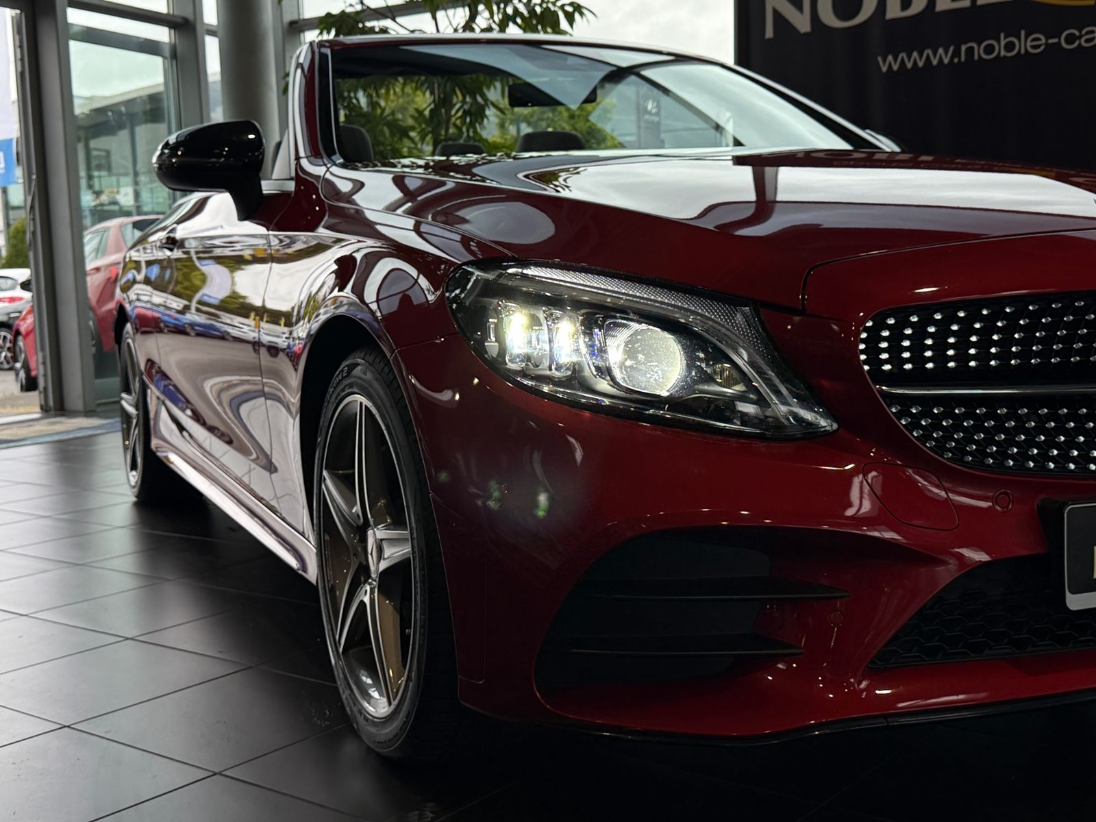 Fahrzeugabbildung Mercedes-Benz C 200 Cabrio AMG NIGHT Navi Rückfahr KAM Sounds.