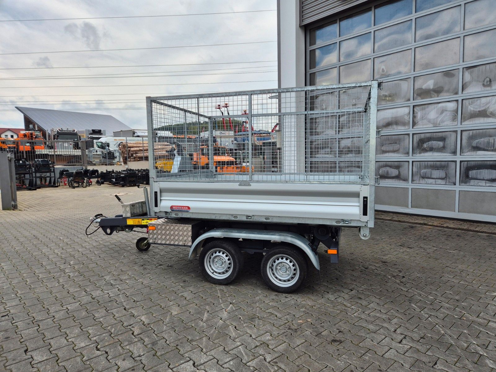 Fahrzeugabbildung Wörmann Abrollkipper Mulde Gitterbox