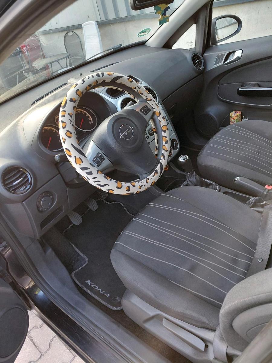 Opel Corsa 2009 — engine 75 HP (55kW)