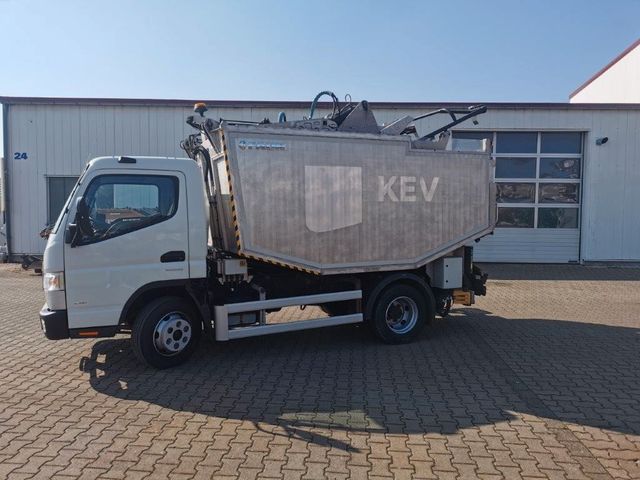 Mitsubishi FAUN CITY 3000 mit Fuso Canter 7C15 AMT 4X2