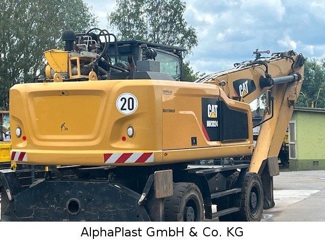 CAT MH3024 Umschlagbagger