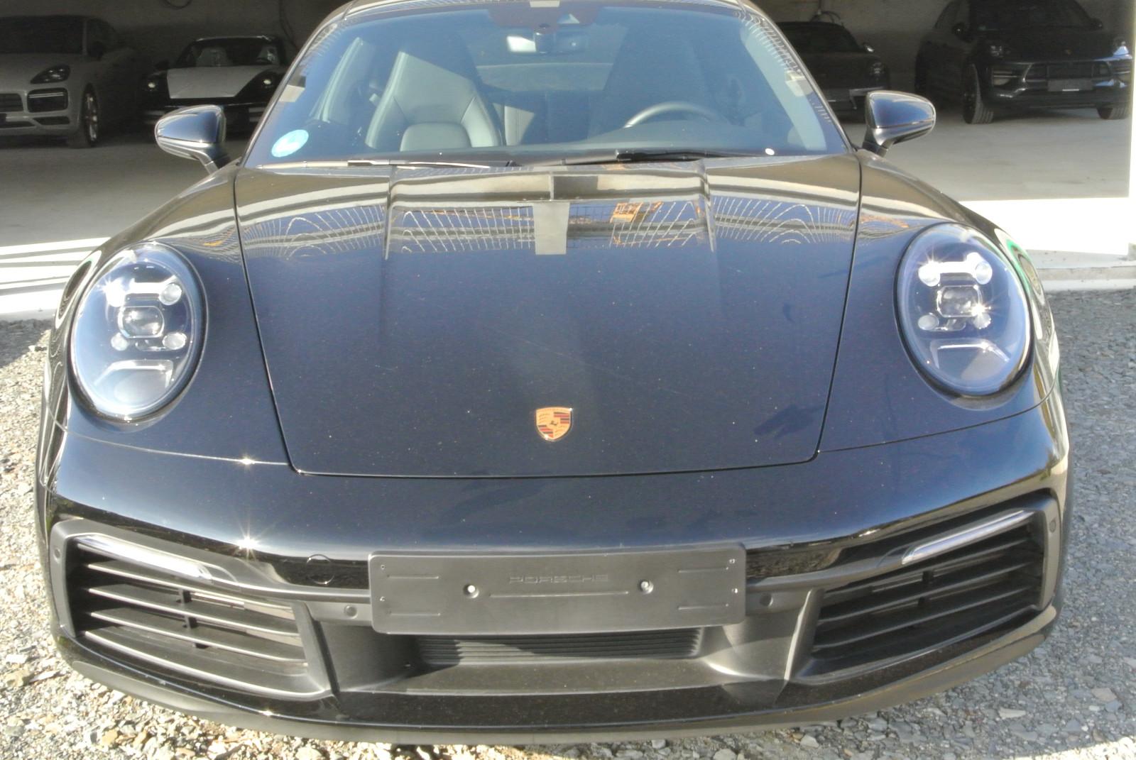 Porsche 992 cabrio ,schw/schw,bose,abgas,kamera,garantie