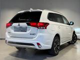 Mitsubishi Outlander Plug-in Hybrid PLUS 4WD 1. Hand AHK - Mitsubishi Gebrauchtwagen in Berlin