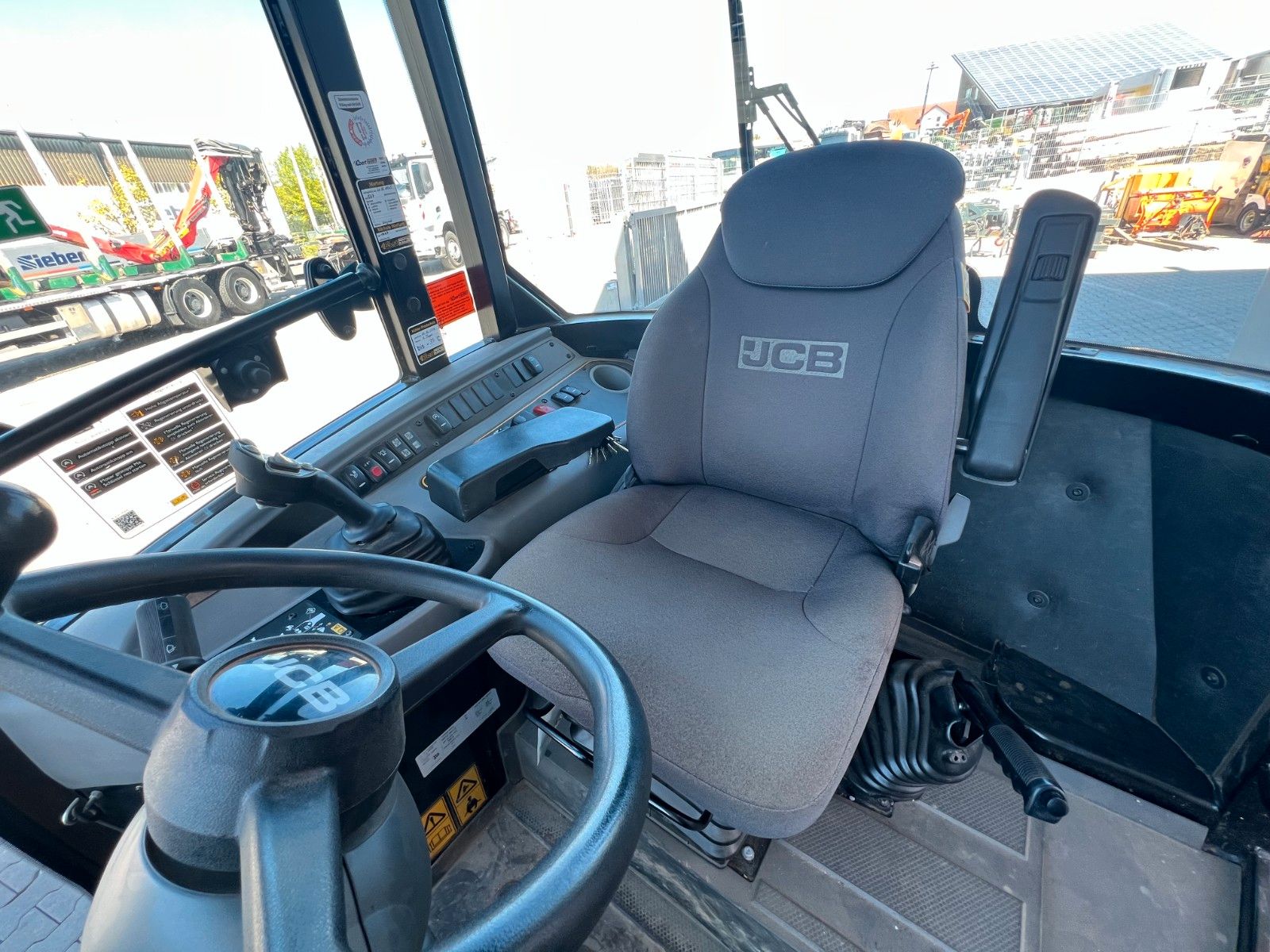 Fahrzeugabbildung JCB 409 SV / nur 758h! / Klappschaufel / Gabel