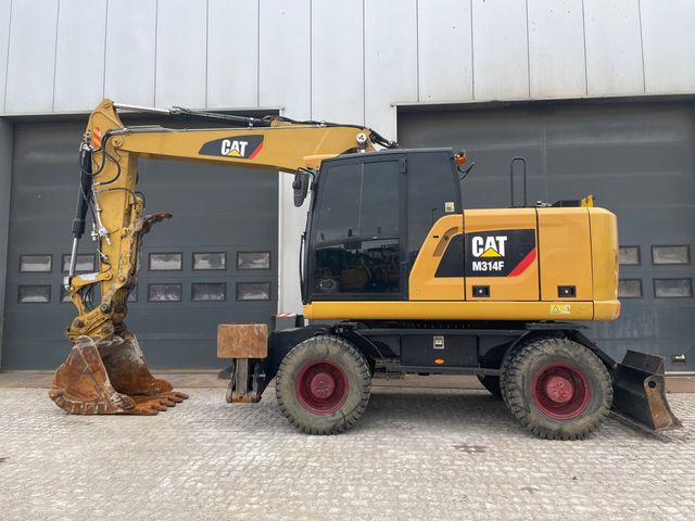 CAT M314F with Outriggers