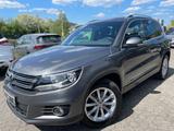 Volkswagen Tiguan 1.4 TSI BlueMot. LOUNGE NAVI/1.HAND/GAR! - Volkswagen Tiguan: Geländewagen