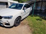 BMW X4 M40 M40i - - weiße BMW X4 M40
