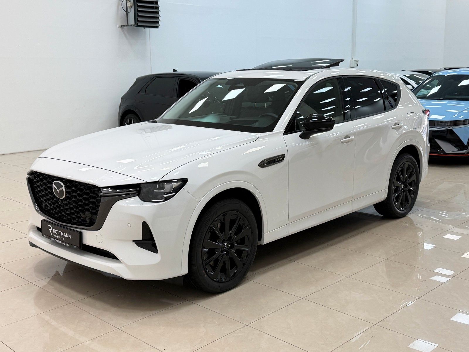 Mazda CX-60 PHEV AWD Aut. HOMURA CON/DRI/COM/PAN-P/ACC imagem 2