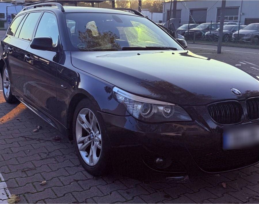 BMW 520 2010 — rear view