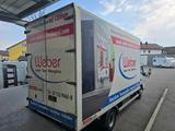 Mitsubishi Canter Fuso mit Kastenaufbau  - Mitsubishi Abrollkipper