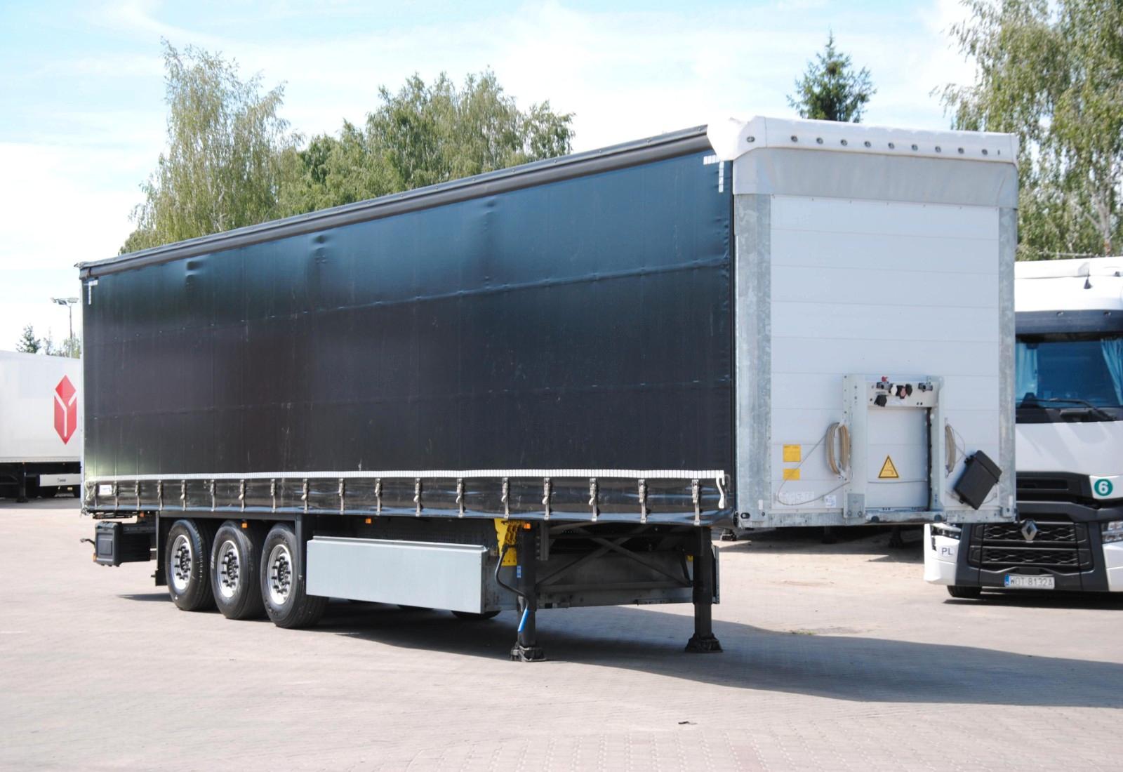 Schmitz Cargobull New tarpaulin, lifting axle